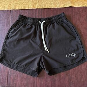 Black fishing Shorts with DSG (Doing something great) outerwear logo.